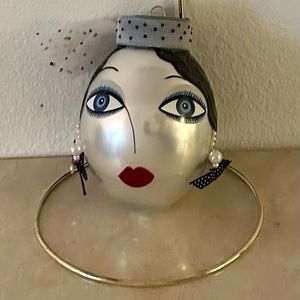 Artist signed Christmas ornament with hanger.